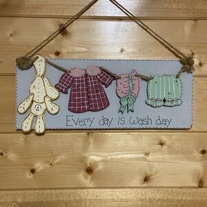 Vintage wooden laundry sign